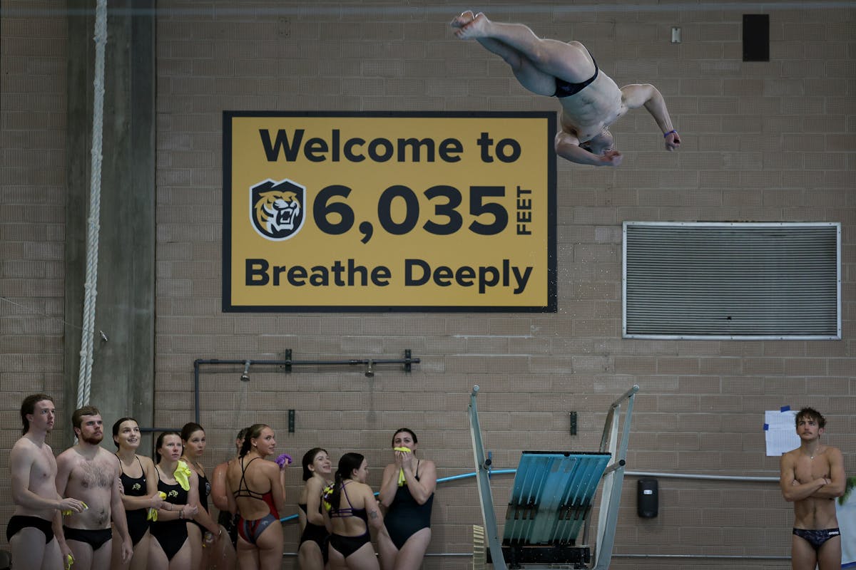 Aidan Richter '25, diving captain, performs a dive on Jan. 18 at Schlessman Natatorium during the CC Classic, where four other swimming and diving teams competed. Photo by Jamie Cotten / Colorado College 